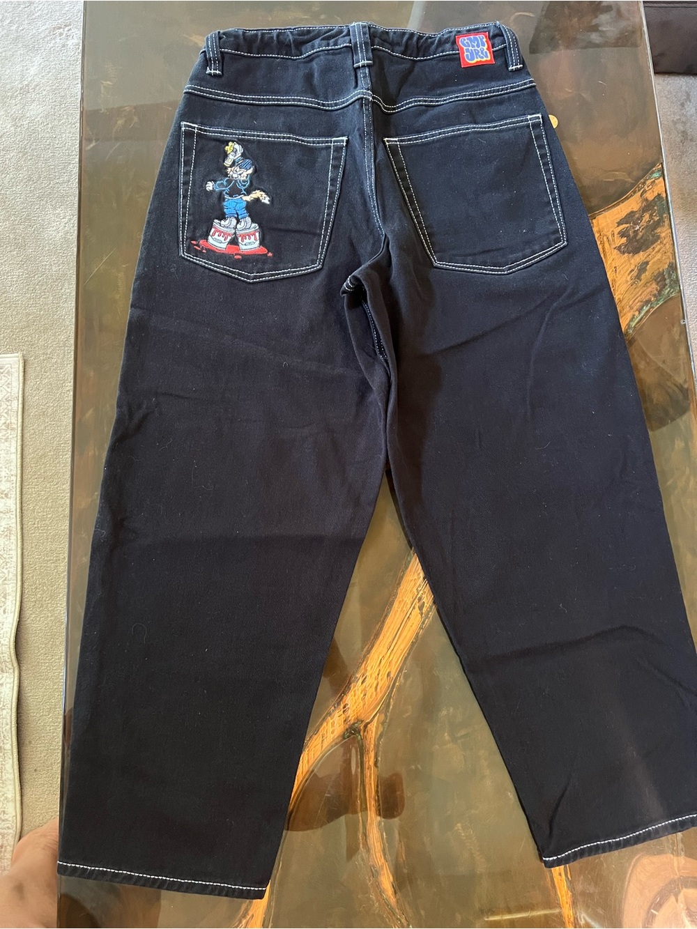 Empyre Black Relaxed Men’s Jeans with Embroidered Character